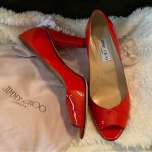 Super cute orange Jimmy Choo peep toe heels